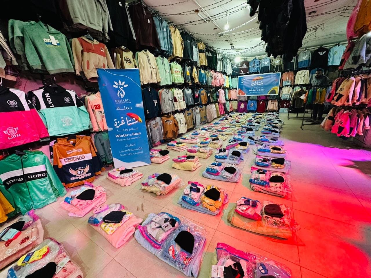 توزيع كسوة شتوية للأطفال الرضع ضمن حملة شتا غزة.. سلام ودفا