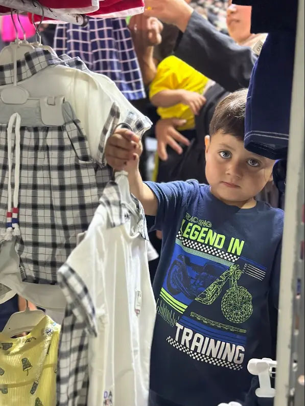 Distribution of Clothing for Children during Eid Al-Adha despite War and Harsh Conditions